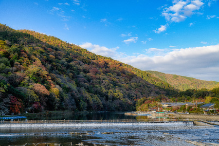 The Togetsukyo Bridge Arashiyama Kyoto Japan in autumnの写真素材
