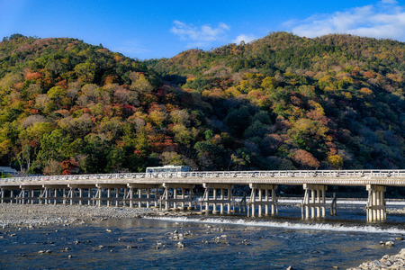 The Togetsukyo Bridge Arashiyama Kyoto Japan in autumnの写真素材