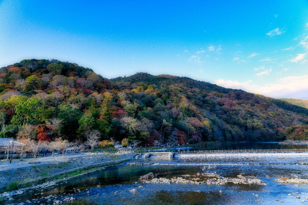 The Togetsukyo Bridge Arashiyama Kyoto Japan in autumnの写真素材