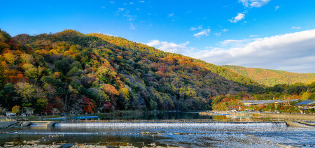 The Togetsukyo Bridge Arashiyama Kyoto Japan in autumnの写真素材