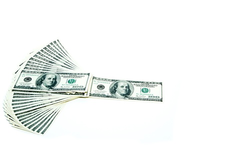 100 dollar bills on a white background. Fan stack.の写真素材