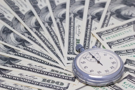 100-dollar bills with a timer on it  Full frame の写真素材