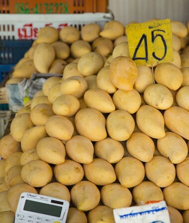 Stall of mangos on thai market for sale