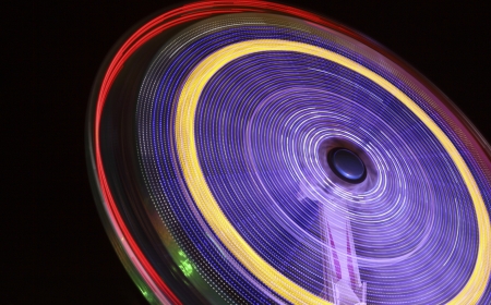 A rotating ride at the Oktoberfest at nightのeditorial素材