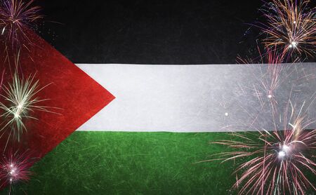 Textile flag of State of Palestine with firework grunge concept seamless close up with wind waves in the real fabricの写真素材