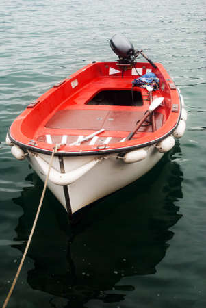 red boat at the dock