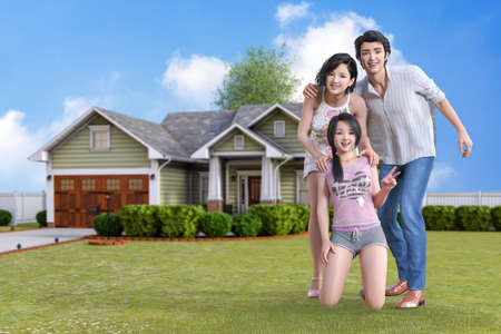 Three smiling parents and children pose for a commemorative photo in front of their own home in a house.3D illustration 3D renderingの写真素材