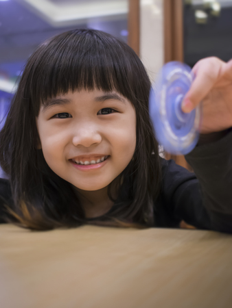 A Child Proudly Shows and Shares New Toyの写真素材