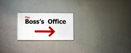 Sign that Points to The Boss's Office