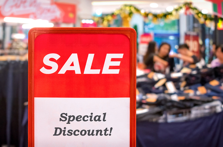 Red Special Discount Sale Sign in the Shopping Mall during the Holidays