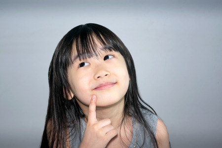 Asian Little Girl  Actively Brainstorming New Ideas