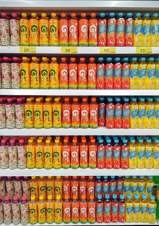 BANGKOK, THAILAND - JANUARY 26: BigC Extra Petchkasem hypermarket fully stocks various flavor of bottled tea on the shelves on January 26, 2019.のeditorial素材