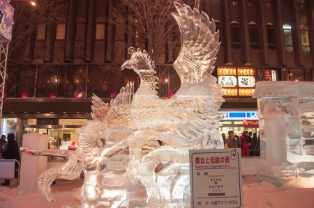 Sapporo, Japan - February 8, 2013  The 33rd Susukino Ice Festival  Photo showing a heroine and a legendary bird with the ice sculpture theme  Beauty and a legendary bird のeditorial素材