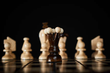 Chess board with the black queen as protagonist, black backgroundの写真素材