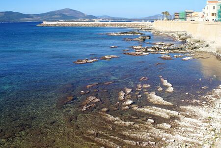 Sea and fortification in Alghero, Sardinia - Italyの写真素材
