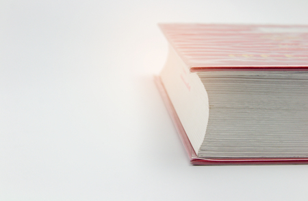 A red book on white background