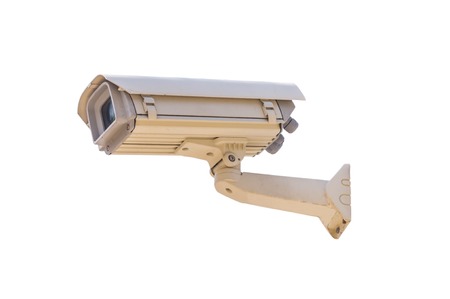 Old security camera isolated on a white background.