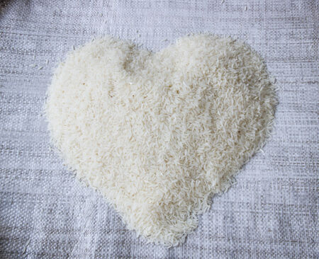 Uncooked jasmine rice heart signの写真素材