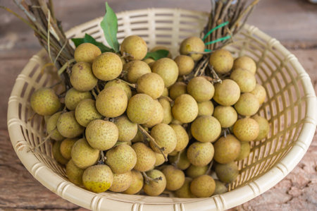 Fresh longan fruits in basket.の写真素材