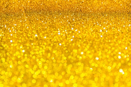Bokeh gold color abstract background.