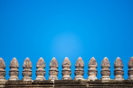 Old brick wall with blue sky background.の写真素材