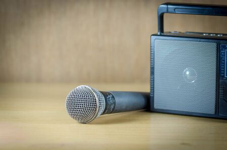 radio and microphone on table old style photo.の写真素材