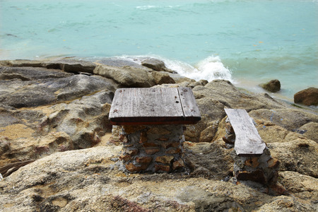 table and chair on the rock in thailandの写真素材