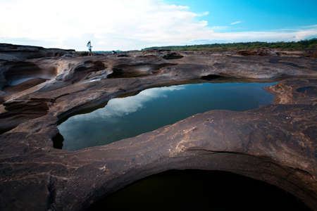 water and mountain in sun lightの写真素材