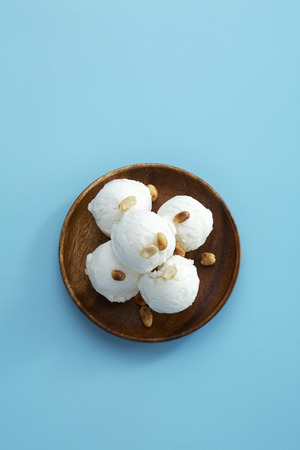 thai coconut icecream on light blue table in thailandの写真素材