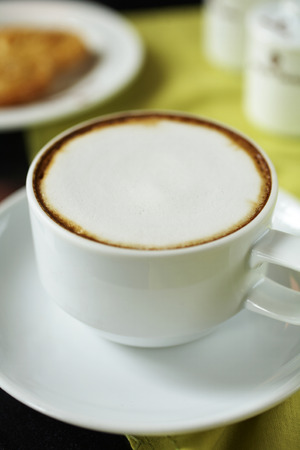 close up hot cappuccino in white cupの写真素材