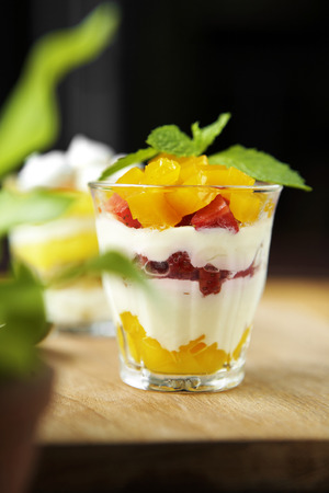 close up strawberry and mango pudding in cupの写真素材