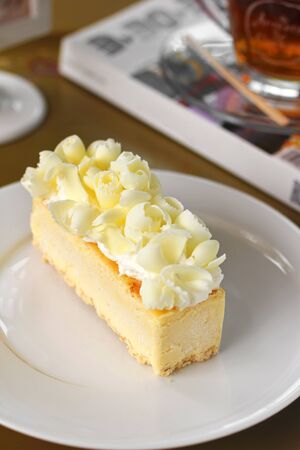close up orange cheese cake in coffee shop