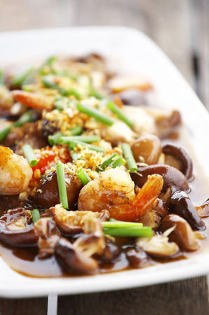 close up chinese food from mushroom and shrimp fried in white dishの写真素材