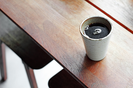 close up hot espresso on wooden table