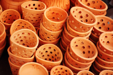 close up old flower clay pot in marketの写真素材