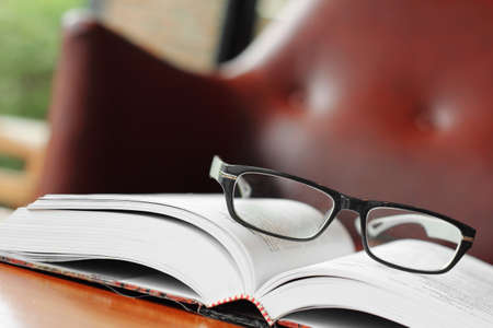 close up plastic classic glasses on bookの写真素材