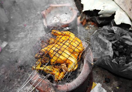 close up thai chicken barbecue in sun lightの写真素材