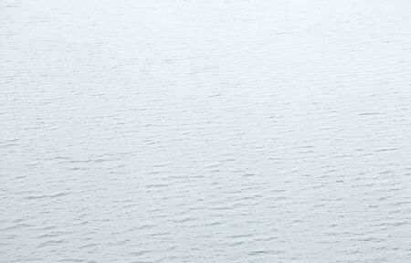 Texture of water surface in sunlightの写真素材