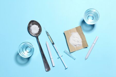 cocaine in paper and equipment on color background with a blank space for a text, Background from cocaine partyの写真素材