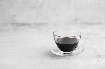 Coffee in cup on rustic table with a blank space for a text, Espresso in cup on white backgroundの写真素材