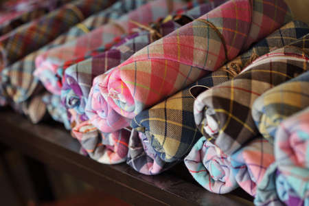 Group of color cotton plaid shirt in storeの写真素材