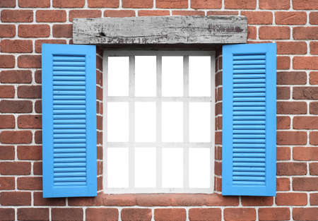 wooden window on red brick wall