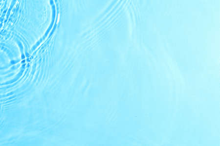 texture of splashing clean water on pastel backgroundの写真素材