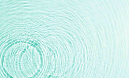 texture of splashing clean water on pastel backgroundの写真素材