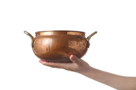 Young woman girl holding copper soup pot isolated on white background
