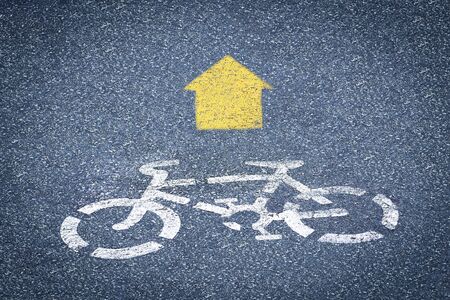 picture of white painted sign for bikes lane 