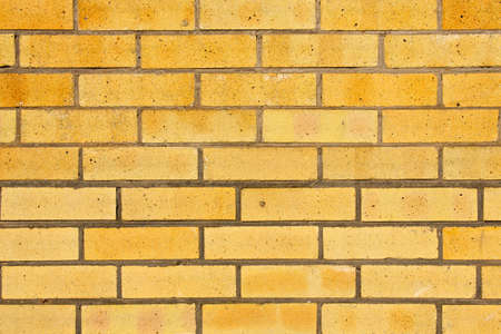 orange brick wall orange textured background: masonry