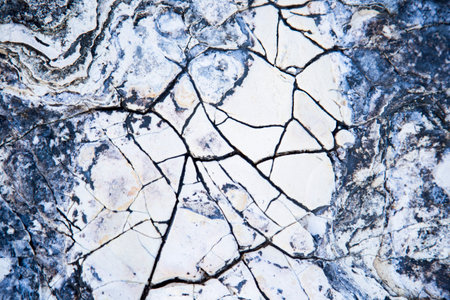 Close up of cracked stone texture. Abstract background and texture for design.の写真素材