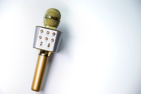 Gold microphone on a white background. close-up. studio shot.の写真素材