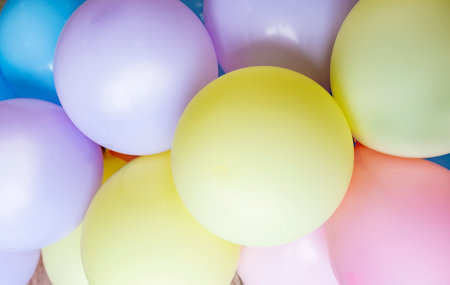Colorful balloons celebration background The background is blurred.